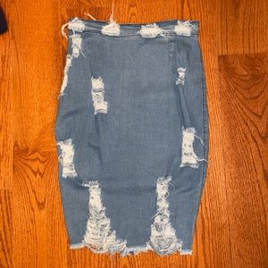 Midi denim fashion nova skirt with rips!